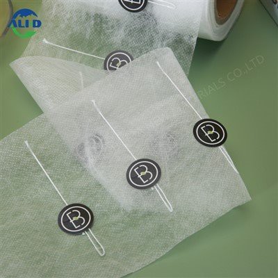 Kofe va choy paketlari uchun yorliqli va ipli oziq-ovqat darajasidagi PLA to'qilmagan mato rulosi